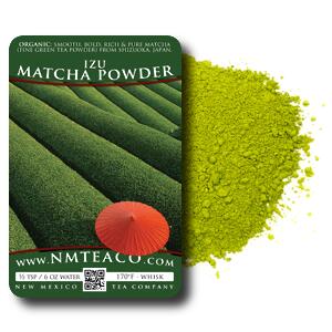 Flat-lay of Japanese tools for brewing matcha tea. Matcha powder